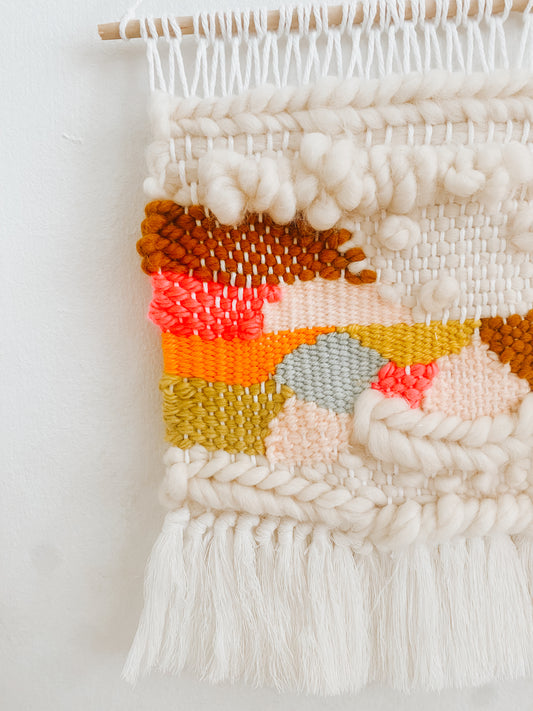 colorful textured woven wall hanging
